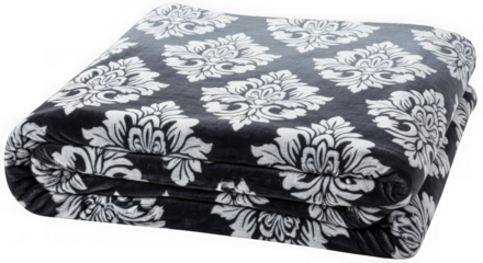 Soft black and white damask pattern plush fleece blanket folded on a transparent background
