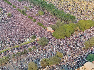 Aerial view of a crowds gathered during the funeral of martyred Sharif Osman Hadi before the Jatiya Sangsad Bhaban parliament building, Dhaka, Bangladesh, 20 December 2025.