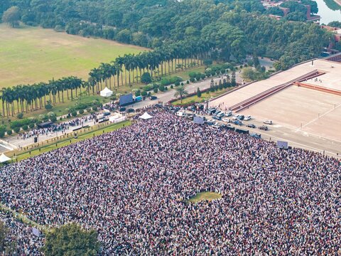 Aerial view of a crowds gathered during the funeral of martyred Sharif Osman Hadi before the Jatiya Sangsad Bhaban parliament building, Dhaka, Bangladesh, 20 December 2025.