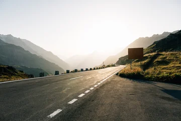 Fototapete Alpen Scenic road through the Swiss Alps at Sustenpass, Berna, Switzerland, during sunset.  © jjfarq
