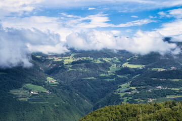 Fototapeta premium Hill with houses and green trees in Italy