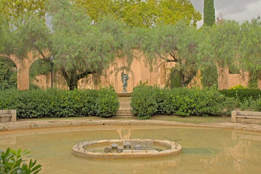  fountain in Jardis de Laribal park with statue and trees on Montjuic hill, Barcelona, Catalonia, Spain 