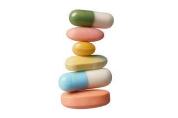 Stack of colorful medicine pills and capsules balancing, symbolizing healthcare, harmony, and pharmaceutical treatment
