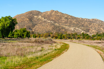 Winding Paved Path Through Scenic Desert Landscape