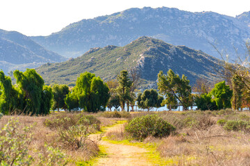Scenic Path to Lake Perris Mountains and Green Trees