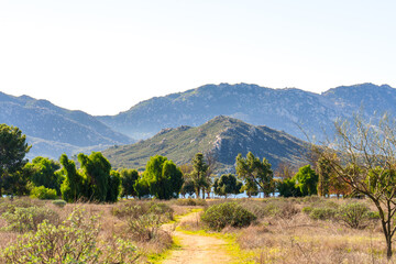 Lake Perris Path Winding Through Nature Towards Mountains