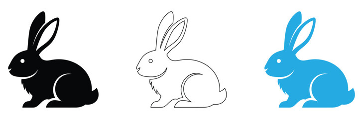 Three rabbits in different colors sitting peacefully