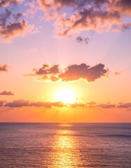 Sunset over the ocean.  Soft, warm colors