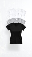 Three plain t-shirts stacked