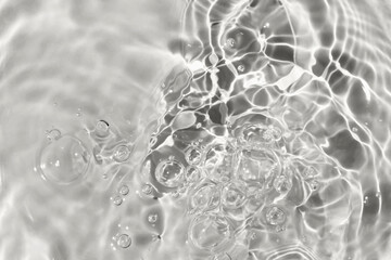Sun glare, big bubbles on water. Gray textured background. Close-up, selective focus, defocus. Demonstrating color of 2026 year, Cloud, Dancer