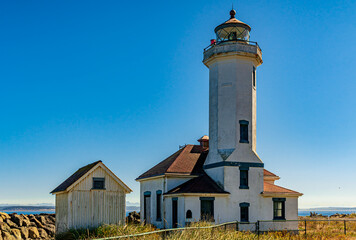 Historic lighthouse and keepers house at Fort Worden State Park in Washington