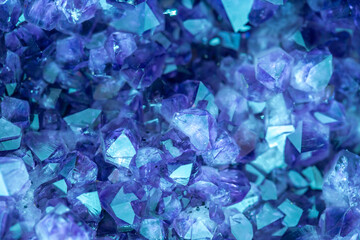 Blue Crystal Mineral Stone. Gems. Mineral crystals in the natural environment. Texture of precious and semiprecious stones. Seamless background with copy space colored shiny surface of precious stones