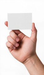 Fototapeta premium A hand holds a blank white business card against a plain background, symbolizing new beginnings and professional opportunities.