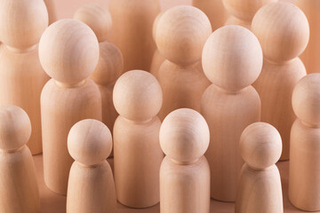 Large group of wooden people figurines