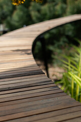 Wooden walkway bridge for decorating in a public park