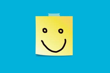 Happy faces drawn on sticky notes.