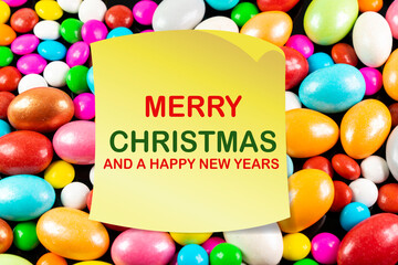 Sticky note with Merry Christmas And a Happy New Years