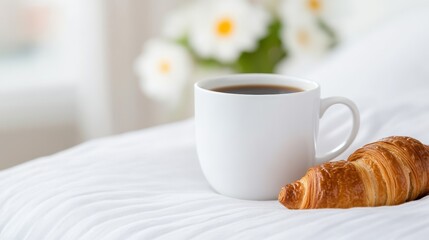 Morning indulgence with coffee and croissants in a cozy hotel room