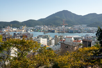 Tongyeong City, South Korea, October 10, 2025: Open Field View from Seoporu Wooden Pavilion where...