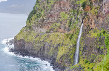 Coastal Waterfall and Cliffs Along the Atlantic Ocean