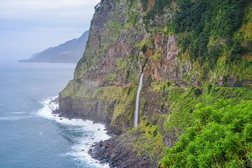 Coastal Waterfall and Cliffs Along the Atlantic Ocean