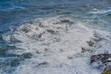 Powerful Ocean Waves Crashing on Rocky Coast