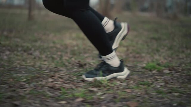 Closeup Of Foot Exerting Force On Muddy Park Surface Showing Motion And Texture, Detailed Shot Of Forefoot During Push Off On Muddy Track Highlighting Rapid Movement And Textured Grip