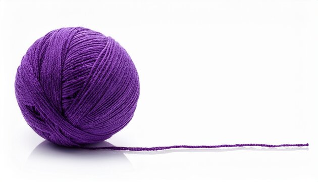 a ball of purple yarn with a long thread isolated on white background