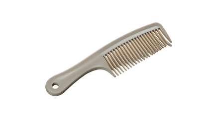 A light gray plastic comb, with a handle and multiple teeth, isolated on a black background