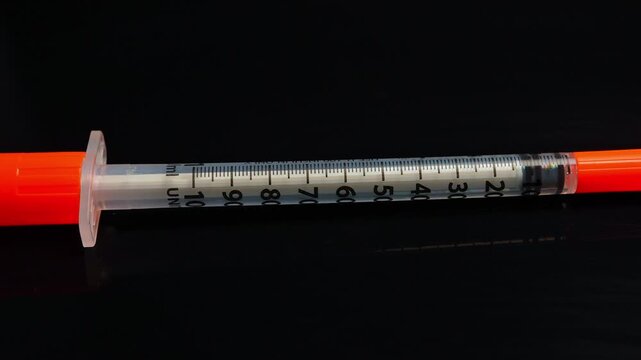 Needle and syringe used to inject drugs into veins, intravenous, muscles intramuscular, and under the skin subcutaneous. Medical equipment.
