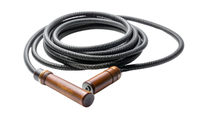 A coiled, dark rope with wooden handles, against a black background