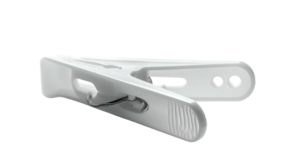 Isolated close-up of a white plastic clothes pin, with metallic spring, open against black