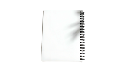 A pristine white spiral-bound notebook against a stark black background, slightly angled
