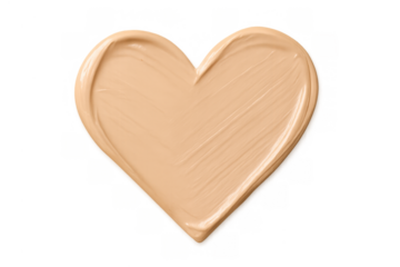 Heart-shaped smear of liquid foundation, showing a creamy texture. Perfect for beauty concepts and skincare designs