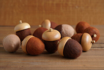 Felt sculpture: Felted acorn set with natural wooden caps and brown wool centers