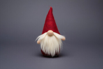 Felt sculpture: Handcrafted needle felted gnome with long white beard and red hat