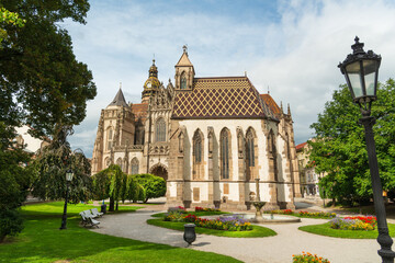Beautiful city park in front of medieval Saint Michael chapel and Saint Elizabeth cathedral on Hlavna (Main) pedestrian street in downtown Kosice, Slovakia