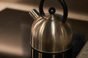 Tea pot in a stove