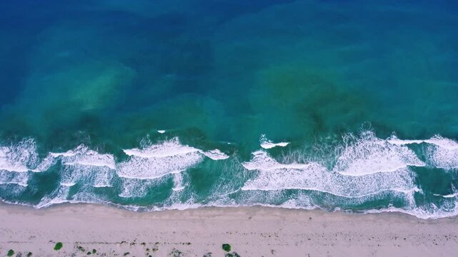 From a bird's-eye view, Patara Beach in Turkey is considered the longest sandy beach in the country. Turquoise sea from a bird's eye view. Aerial view of the pristine Patara Beach in Antalya. 4К