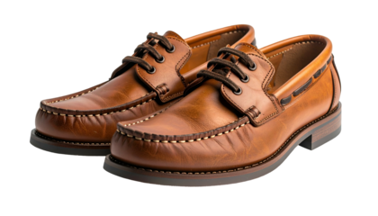 A pair of brown leather boat shoes with laces, isolated on a black background