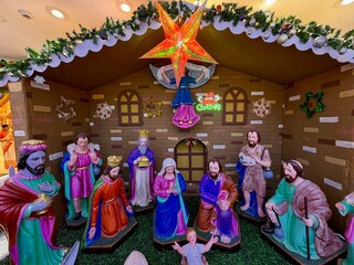 Christmas nativity scene. Holy Family&mdash;Mary, Joseph, and the infant Jesus in a manger.