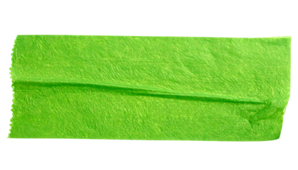 Close-up of a rectangular strip of green adhesive masking tape with uneven edges