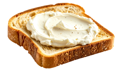 A slice of toasted bread topped with creamy white spread and flecks