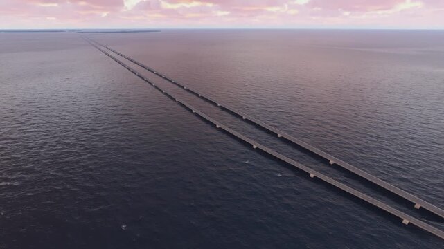 Sunset aerial drone shot of Chesapeake Bay Bridge Tunnel. Virginia Beach. Virginia. United States