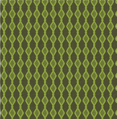 A close-up of a soft, white knitted fabric with a classic cable knit pattern, showcasing the intricate texture and woven loops that create a cozy and inviting look.