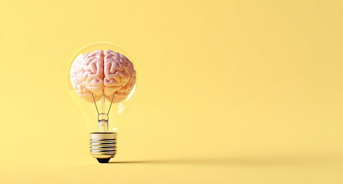 A human brain inside a glass lightbulb on a yellow background