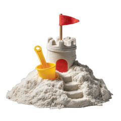 A miniature sandcastle with a red flag, stairs, and yellow shovel against a black background