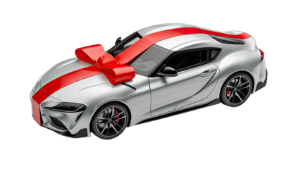 Silver sports car with large red bow on hood, presented as a gift
