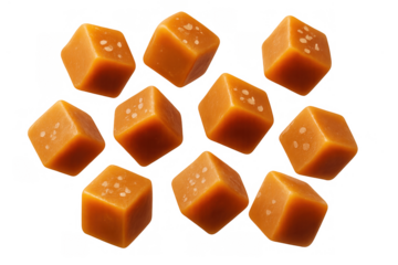 Salted caramel cubes falling, a delicious sweet confectionery treat with sea salt flakes, food on a transparent background