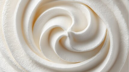 Close-up of Swirled White Frosting or Cream Texture.